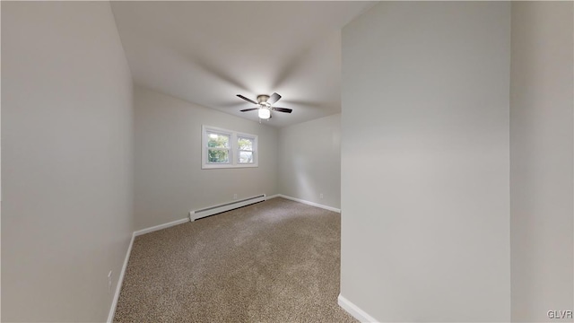 spare room featuring ceiling fan, a baseboard radiator, and carpet floors