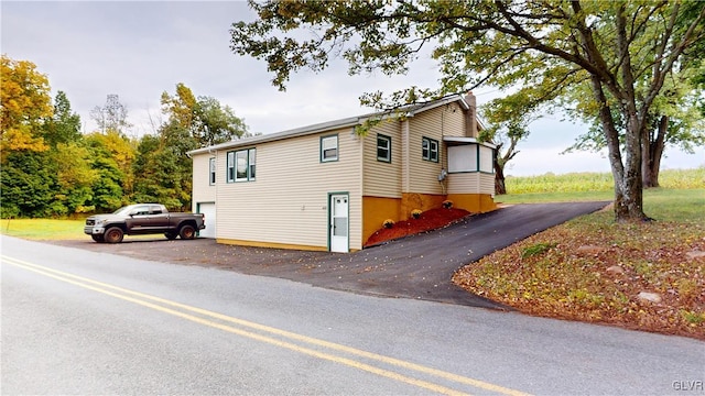 view of home's exterior with a garage