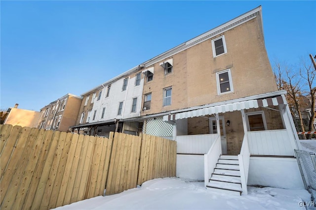 view of snow covered property