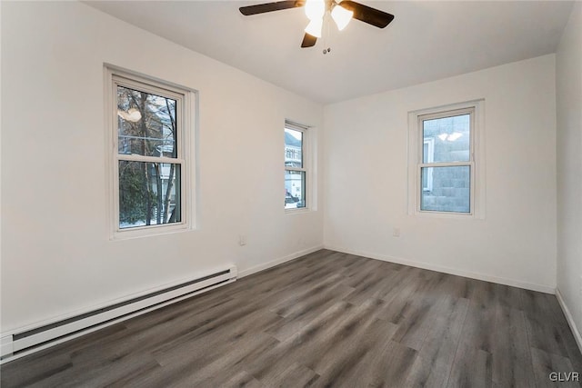 unfurnished room featuring a baseboard radiator, ceiling fan, and dark hardwood / wood-style flooring