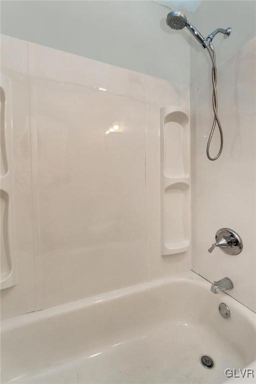 bathroom featuring shower / tub combination