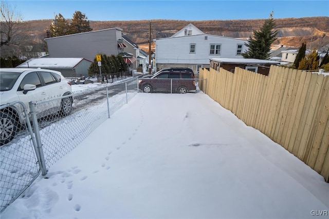 view of yard covered in snow