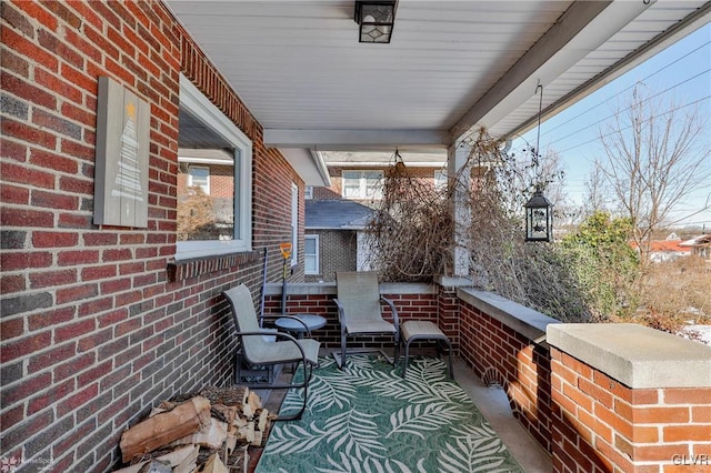 view of patio featuring a porch