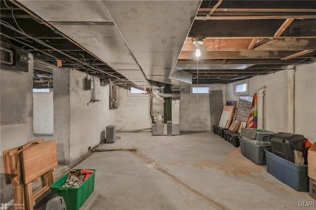 basement featuring heating unit