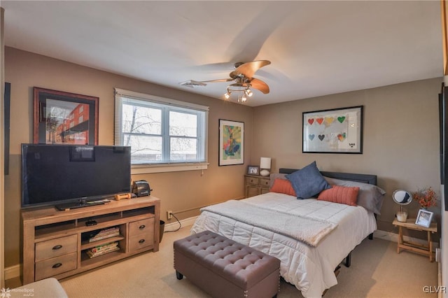 carpeted bedroom with ceiling fan