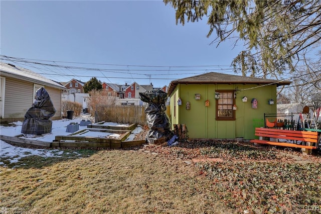 view of yard featuring a wooden deck and an outdoor structure