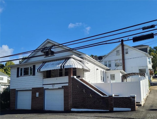 view of front of house with a garage