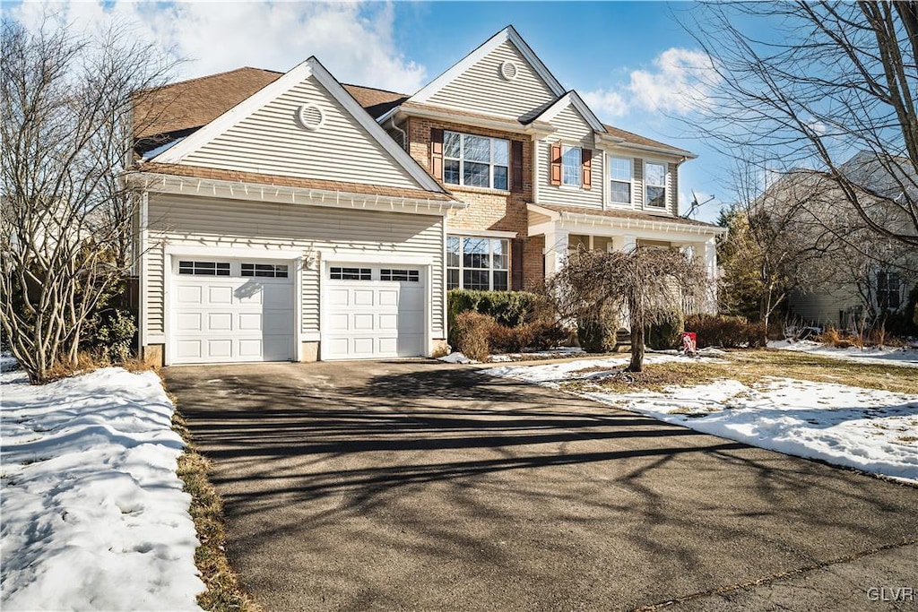 view of front of property featuring a garage