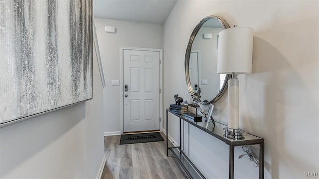 entryway with light hardwood / wood-style floors