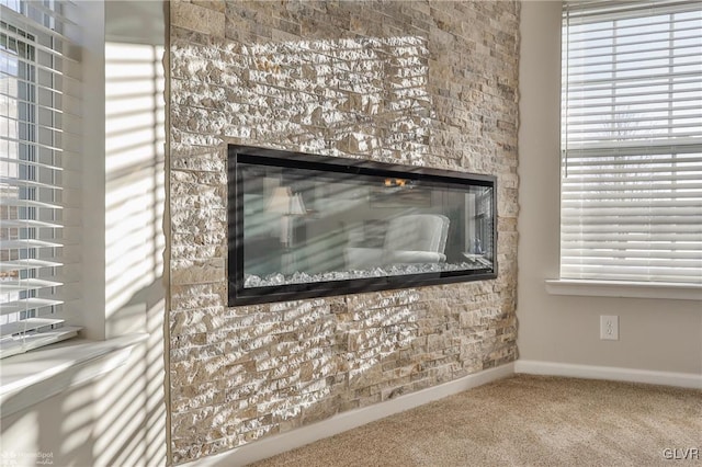 interior details featuring carpet flooring