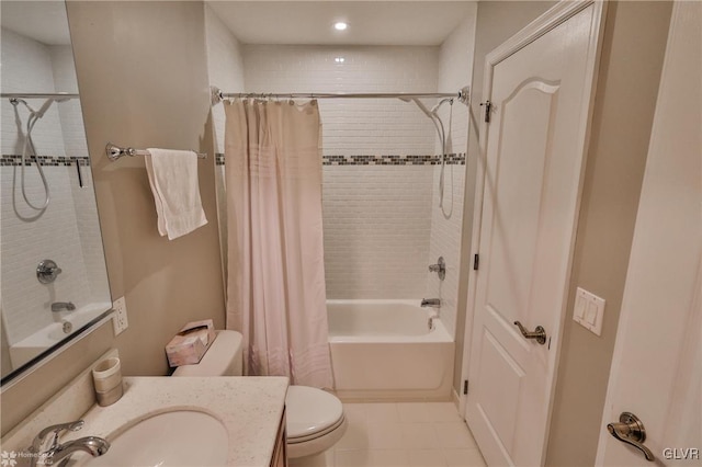 full bathroom featuring vanity, toilet, tile patterned floors, and shower / tub combo with curtain