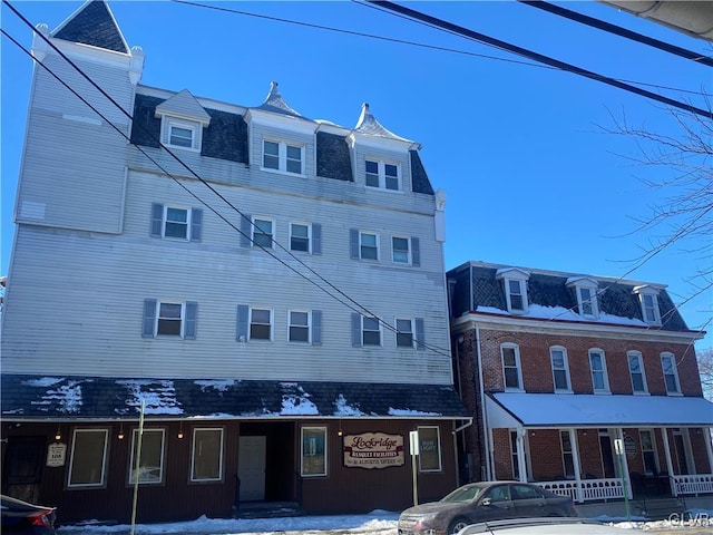 view of snow covered property