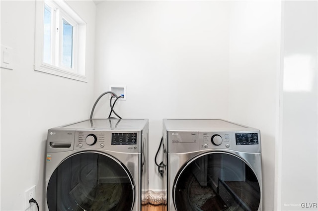 laundry area featuring independent washer and dryer