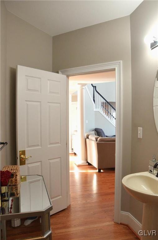 bathroom featuring wood-type flooring