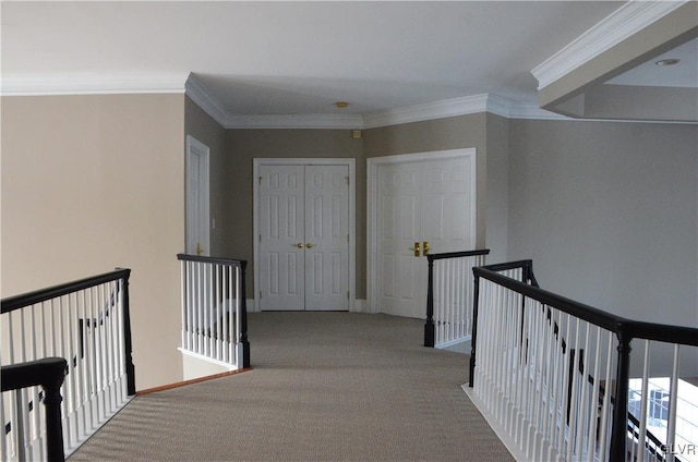 hall featuring ornamental molding and light carpet