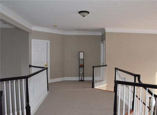 hallway featuring crown molding and light colored carpet