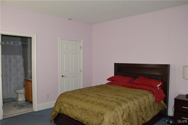 carpeted bedroom with ensuite bathroom