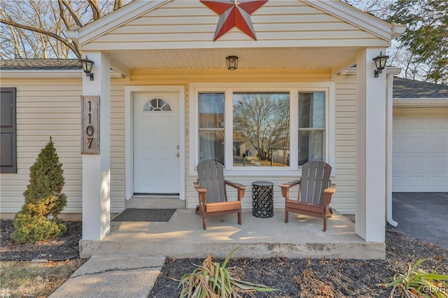 property entrance featuring a garage