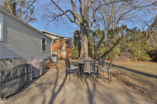 view of patio featuring a grill