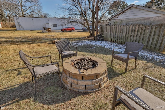 view of patio / terrace featuring a fire pit