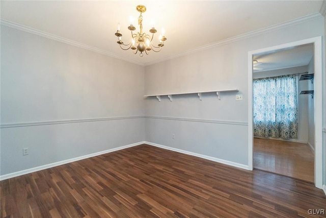 unfurnished room with an inviting chandelier, ornamental molding, and dark hardwood / wood-style floors