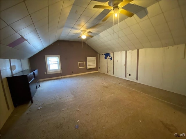 bonus room featuring lofted ceiling and ceiling fan