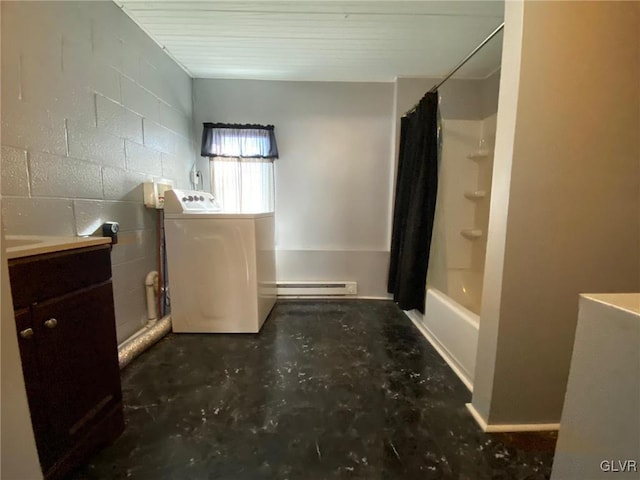 bathroom with concrete flooring, washer / clothes dryer, vanity, baseboard heating, and shower / bathtub combination with curtain