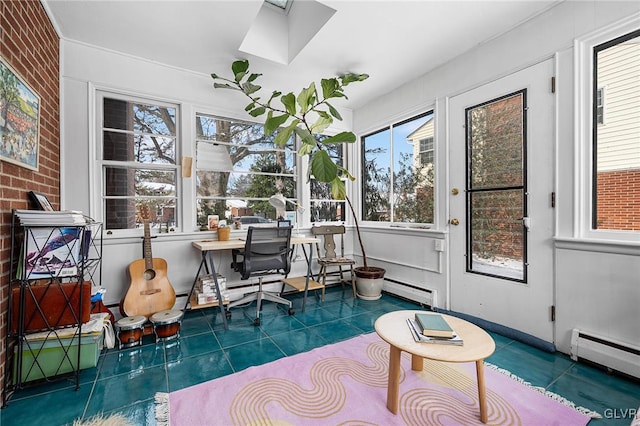 sunroom / solarium with a baseboard radiator and a skylight