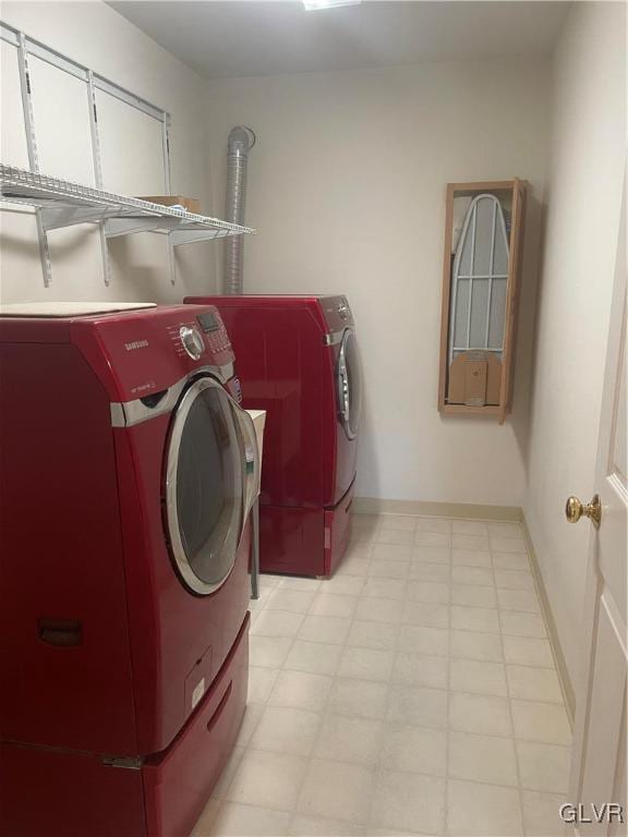 laundry area with washer and clothes dryer