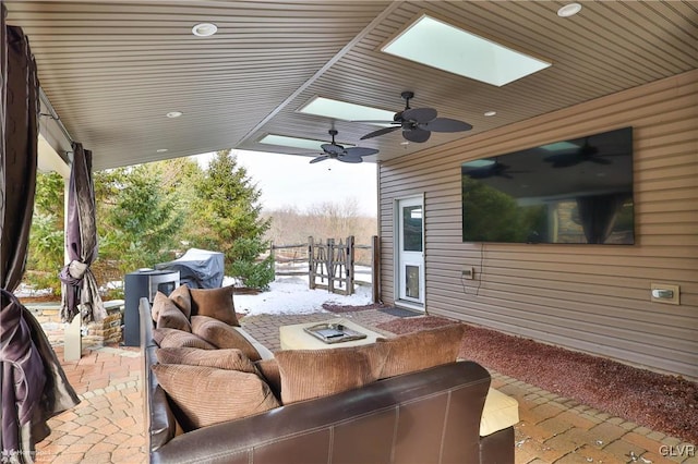 view of patio with an outdoor hangout area and ceiling fan