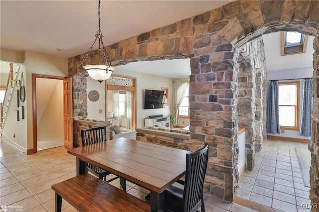 tiled dining area with plenty of natural light