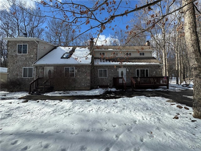 view of front of property with a deck