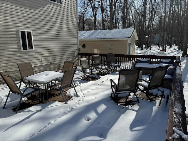 view of snow covered deck