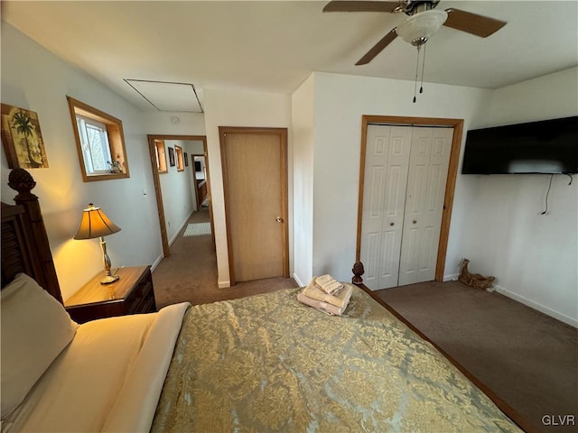 carpeted bedroom with ceiling fan and a closet