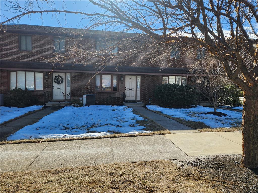 view of front of property featuring cooling unit