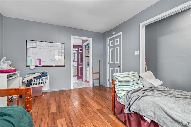 bedroom featuring light hardwood / wood-style floors