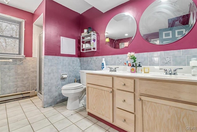 bathroom featuring a shower with shower door, tile walls, a baseboard radiator, tile patterned floors, and toilet