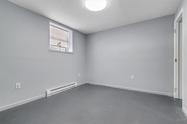 empty room featuring a baseboard radiator