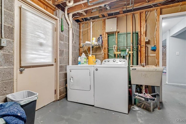 washroom with washer and dryer