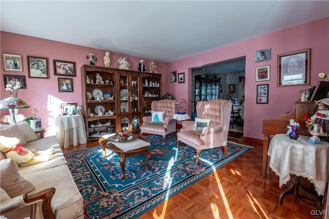 living room featuring parquet flooring