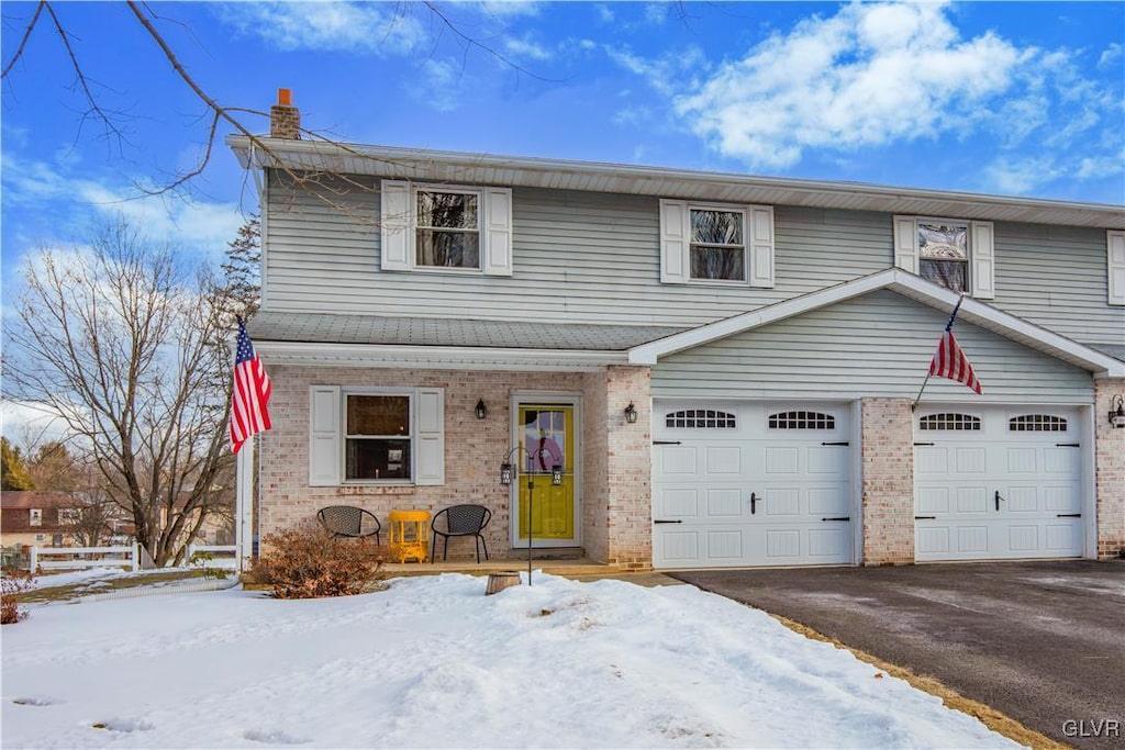 view of front of property featuring a garage