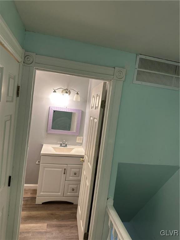 38 12th St, Allentown City, PA 18101 - bathroom with vanity and wood finished floors