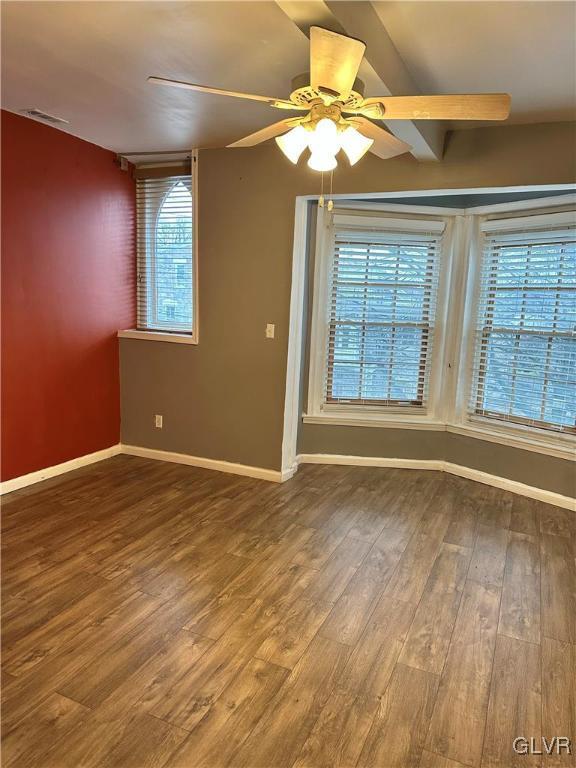 38 12th St, Allentown City, PA 18101 - spare room with baseboards, ceiling fan, and wood finished floors