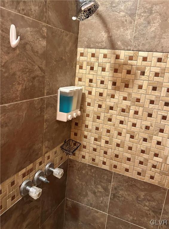 38 12th St, Allentown City, PA 18101 - bathroom view of a tile shower and tile walls
