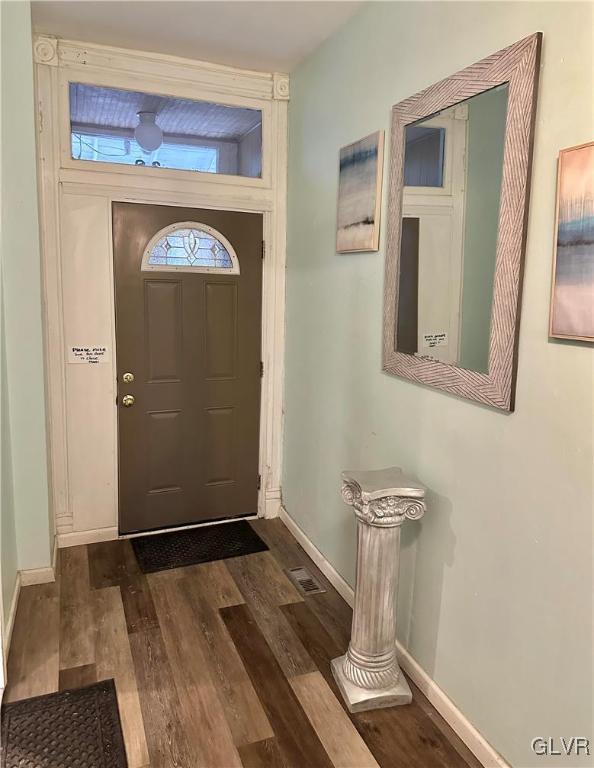 38 12th St, Allentown City, PA 18101 - foyer featuring dark wood finished floors and baseboards