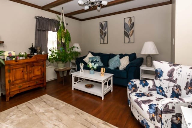 living room with dark hardwood / wood-style flooring, a notable chandelier, ornamental molding, and beamed ceiling