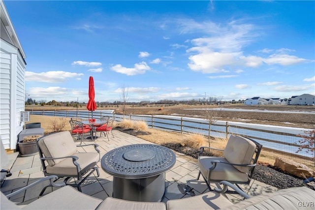 view of patio / terrace with a fire pit