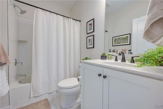 full bathroom featuring shower / tub combo with curtain, vanity, and toilet