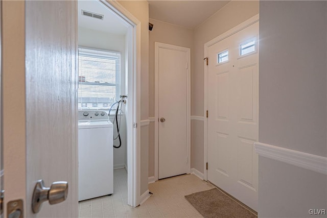 laundry area featuring washer / clothes dryer