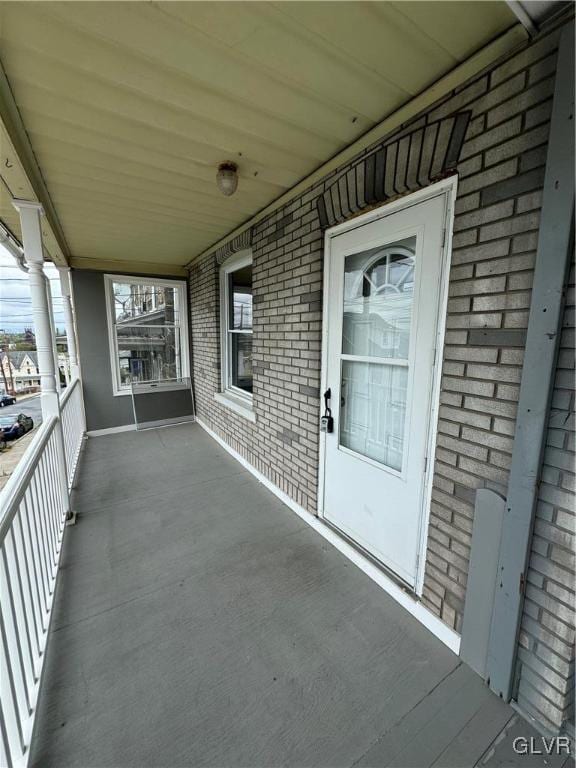 view of patio / terrace with a balcony